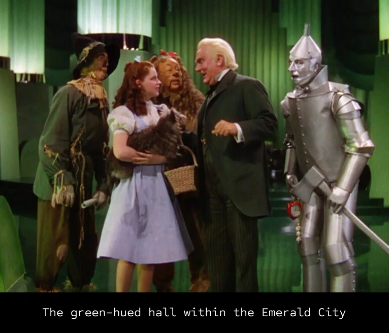 central characters standing in a vibrant, green-hued hall within the Emerald City