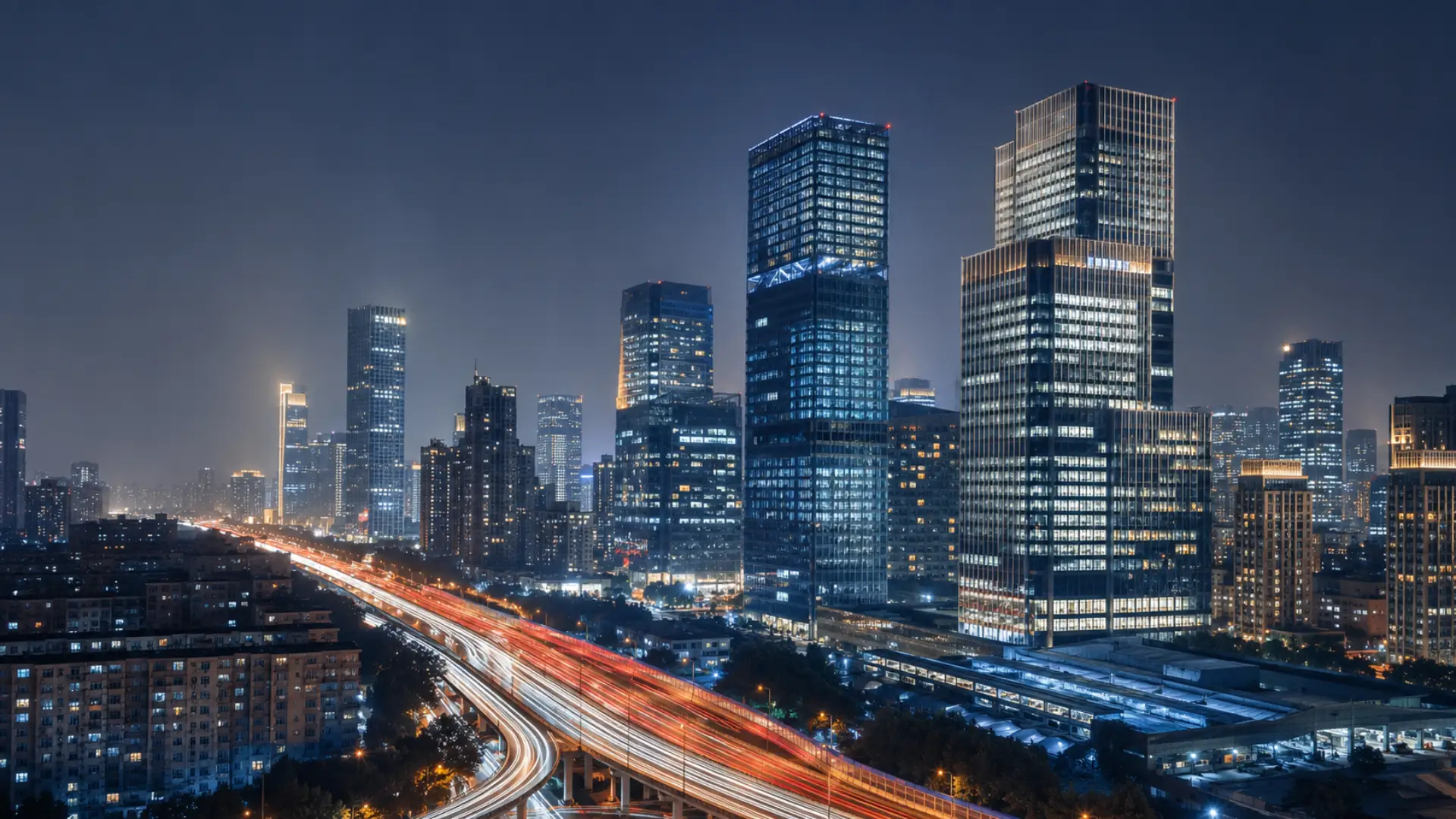 Night skyline of a Chinese tech hub representing open-weight AI labs Moonshot, Z.AI, and DeepSeek