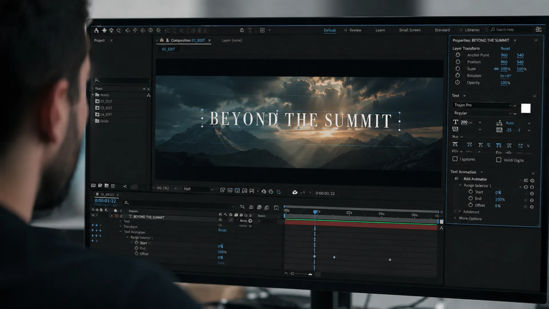 Editor animating a cinematic title with keyframes in the Premiere Pro Essential Graphics panel
